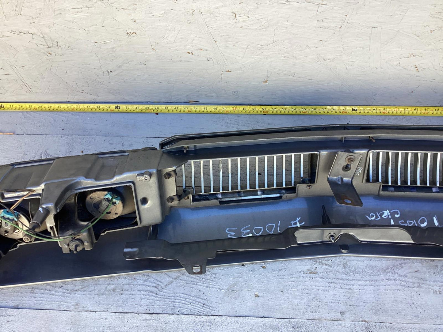 1987-1996 Oldsmobile Cutlass Ciera Front Headlight Header Panel 10068954 OEM