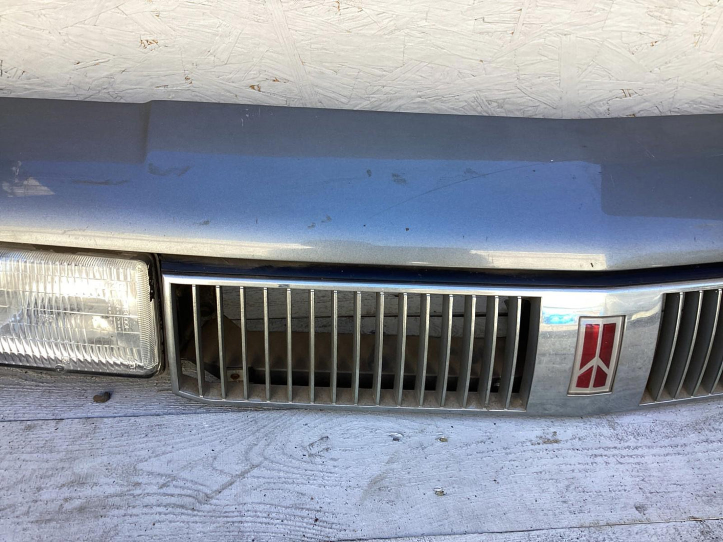1987-1996 Oldsmobile Cutlass Ciera Front Headlight Header Panel 10068954 OEM