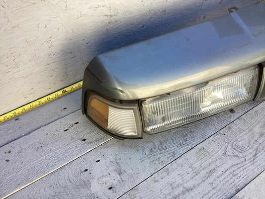 1987-1996 Oldsmobile Cutlass Ciera Front Headlight Header Panel 10068954 OEM