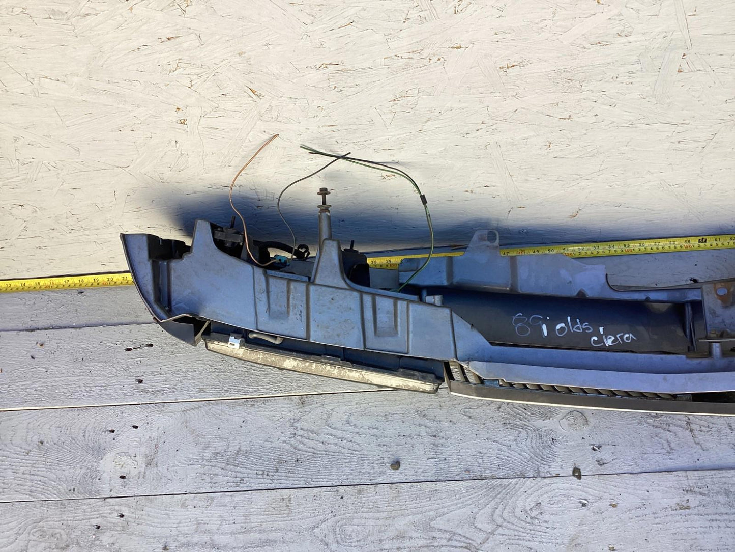 1987-1996 Oldsmobile Cutlass Ciera Front Headlight Header Panel 10068954 OEM