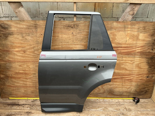 2006 - 2009 Land Rover Range Rover Sport Rear Left Driver Side Door Shell OEM.