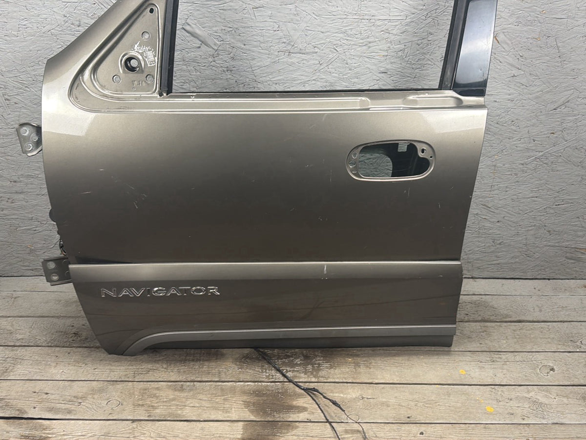 2003-2006 Lincoln Navigator U228 - Left Front Door Shell OEM
