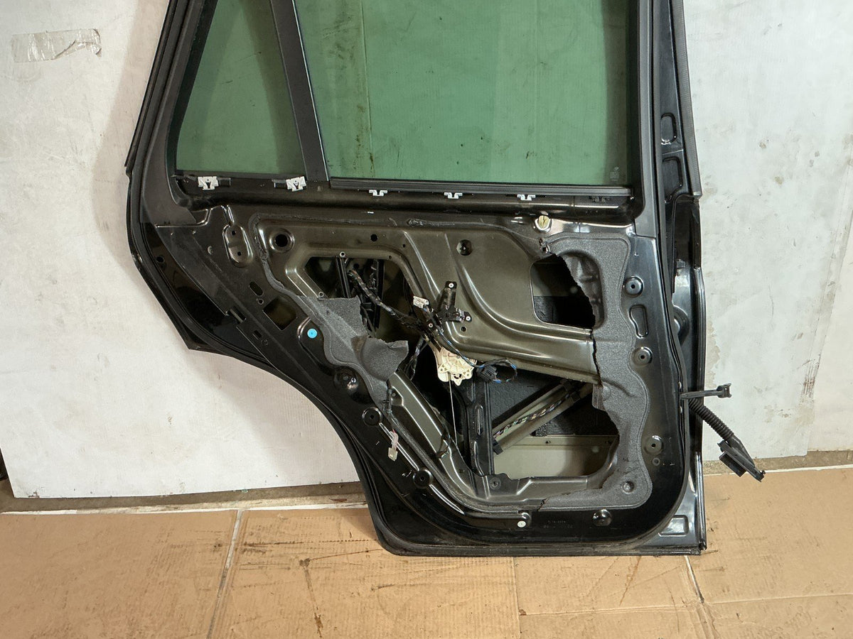 2007- 2013 BMW X5 xDrive50i Rear Left Driver Side Door Shell Panel OEM.