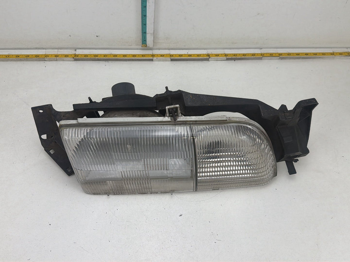 1986-1991 Ford Taurus Front Right Passenger Side Headlamp Light OEM