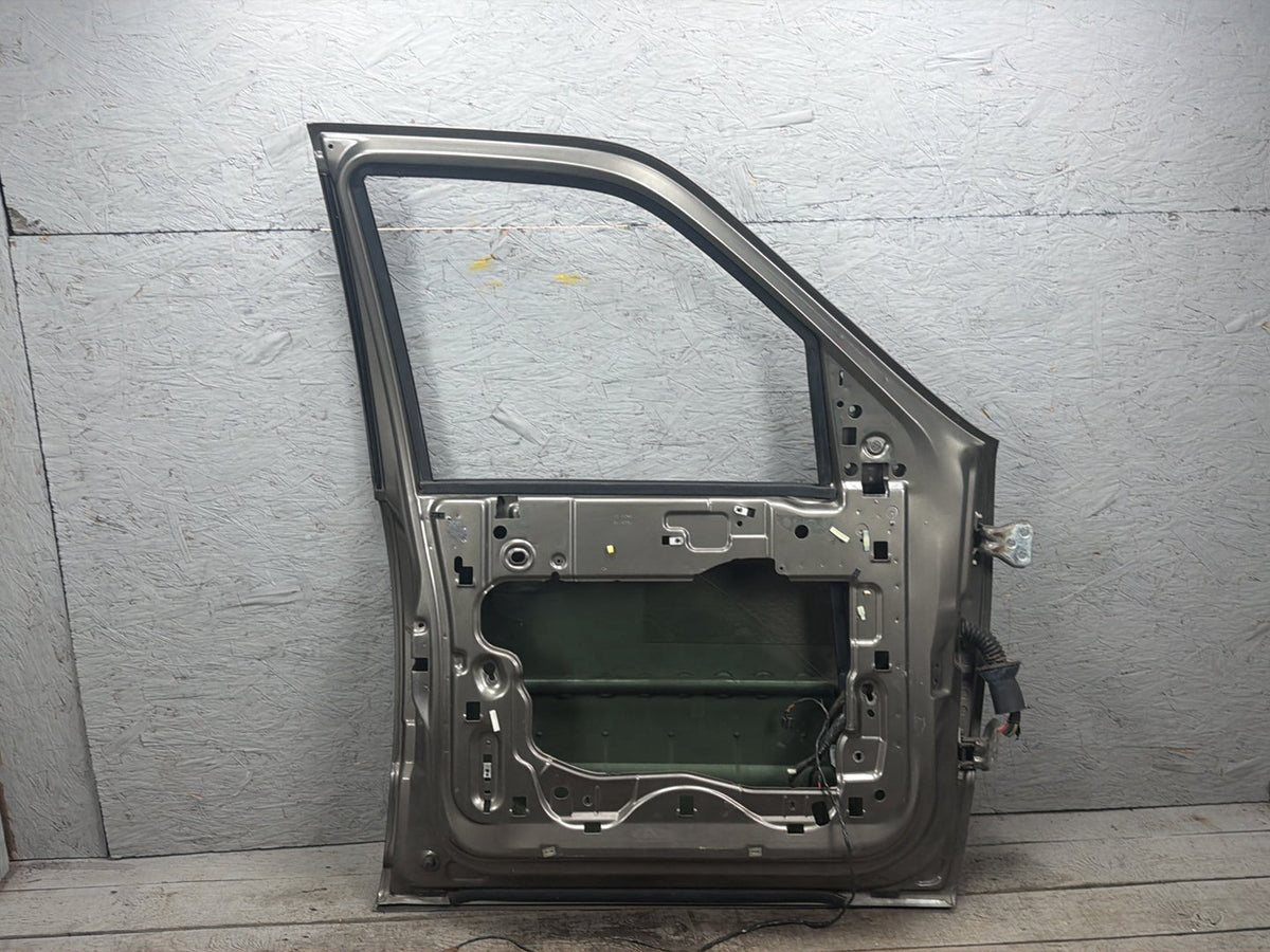 2003-2006 Lincoln Navigator U228 - Left Front Door Shell OEM