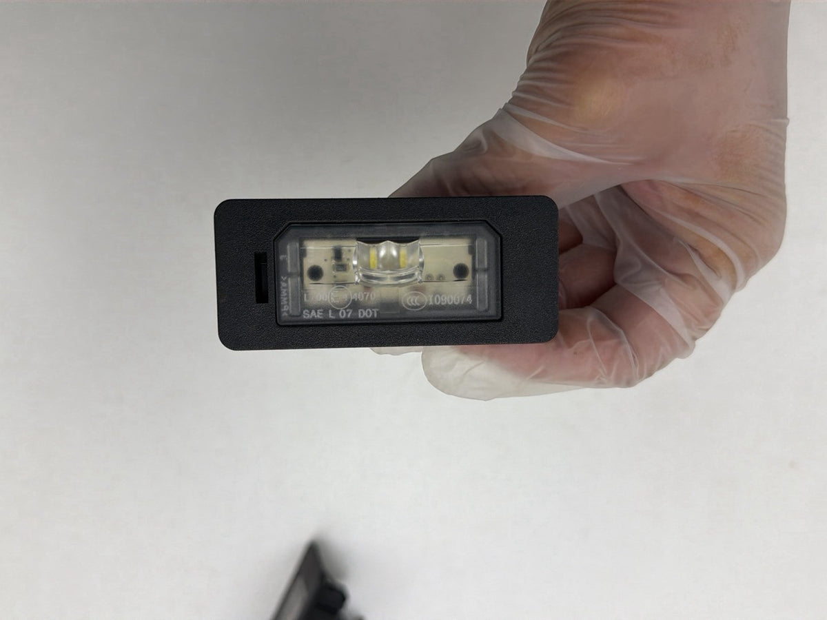 2012-2014 BMW X1 E84 SUV Rear License Plate Light I090074 OEM