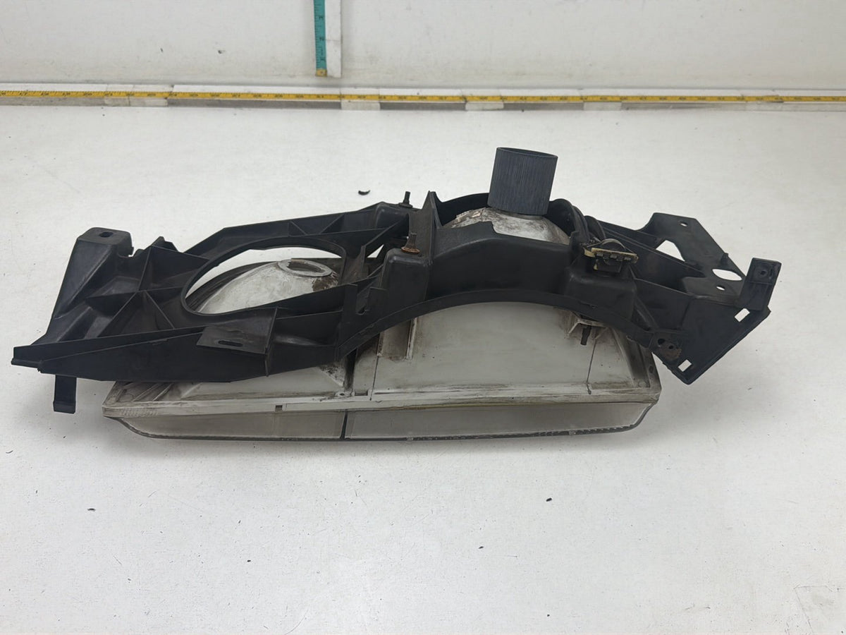 1986-1991 Ford Taurus Front Right Passenger Side Headlamp Light OEM