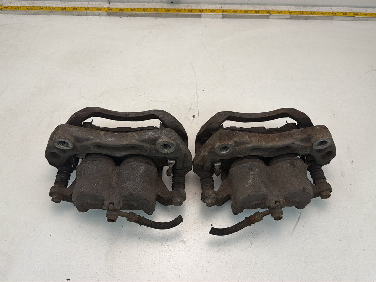 2009-2013 Infiniti G37 Front Dual Piston Brake Calipers w/ Brackets Pair OEM