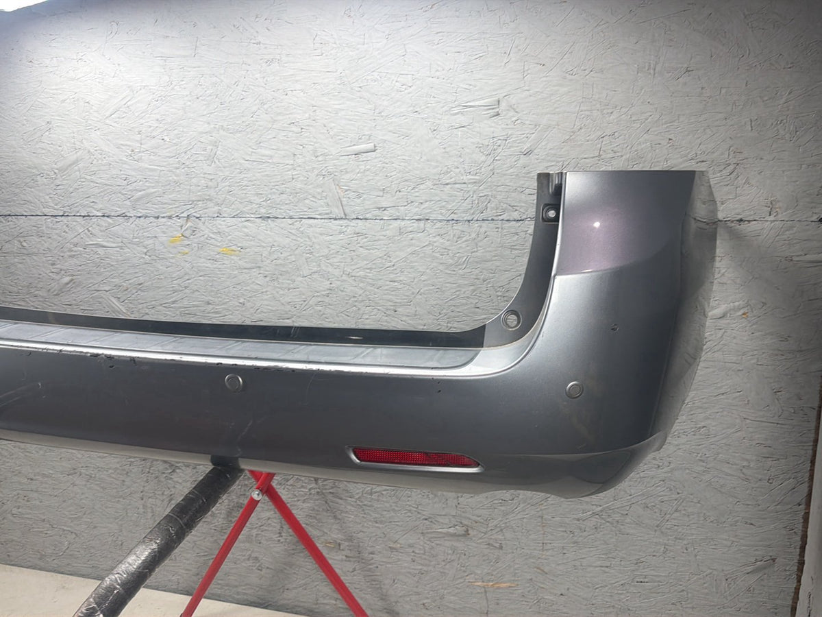 2011-2017 Toyota Sienna Rear Bumper Cover Panel w/ Park Assist OEM