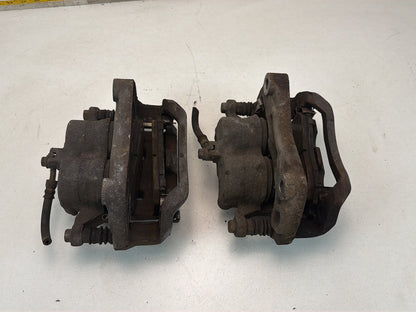 2009-2013 Infiniti G37 Front Dual Piston Brake Calipers w/ Brackets Pair OEM