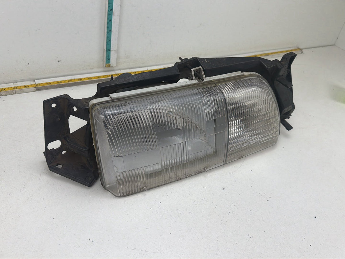 1986-1991 Ford Taurus Front Right Passenger Side Headlamp Light OEM