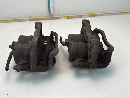 2009-2013 Infiniti G37 Front Dual Piston Brake Calipers w/ Brackets Pair OEM