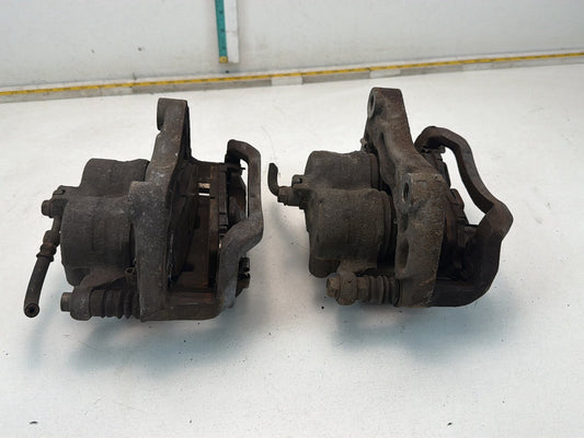 2009-2013 Infiniti G37 Front Dual Piston Brake Calipers w/ Brackets Pair OEM