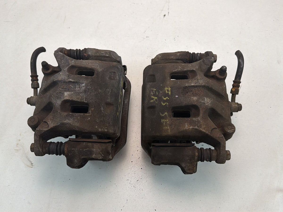 2009-2013 Infiniti G37 Front Dual Piston Brake Calipers w/ Brackets Pair OEM