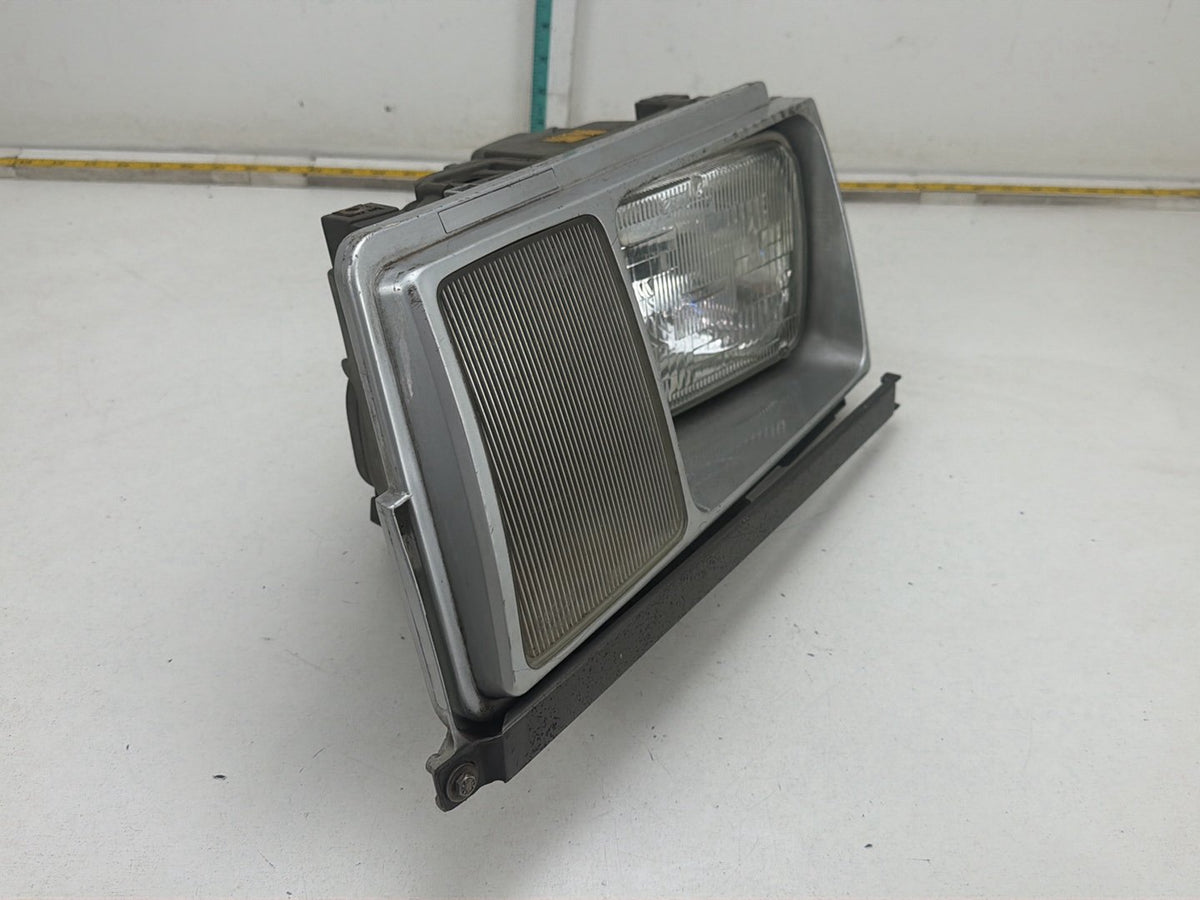 1984-1986 Mercedes-Benz 190D Front Left Driver Side Headlight 1305235085 OEM