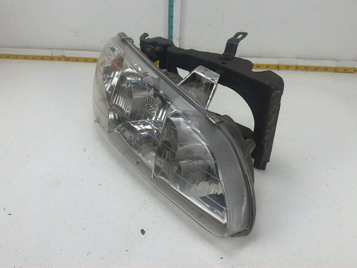 1996-1998 Pontiac Grand AM Front Right Passenger Side Headlamp Light OEM