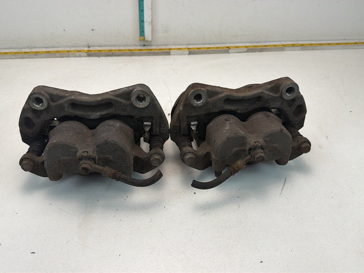 2009-2013 Infiniti G37 Front Dual Piston Brake Calipers w/ Brackets Pair OEM