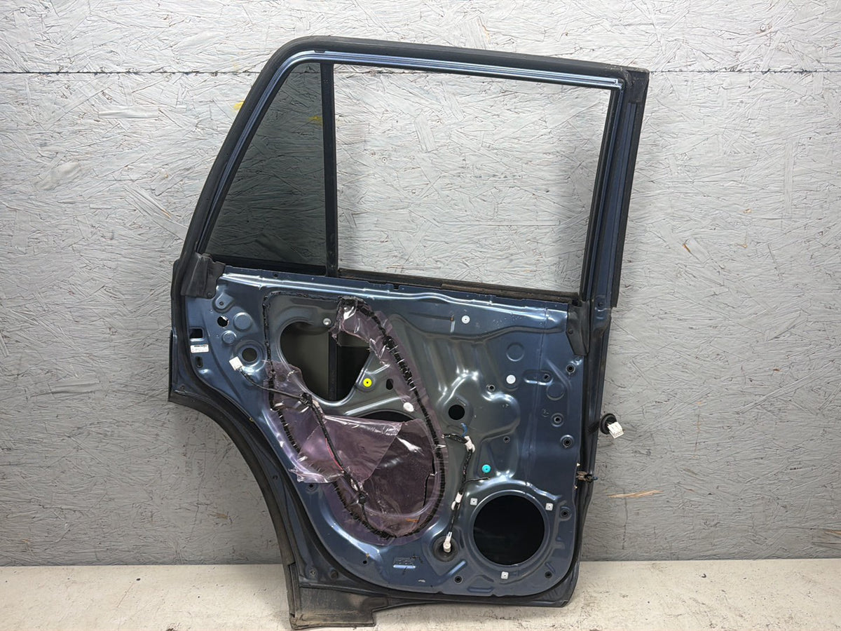 2003-2005 Toyota 4Runner Left Rear Driver Side Door Shell OEM
