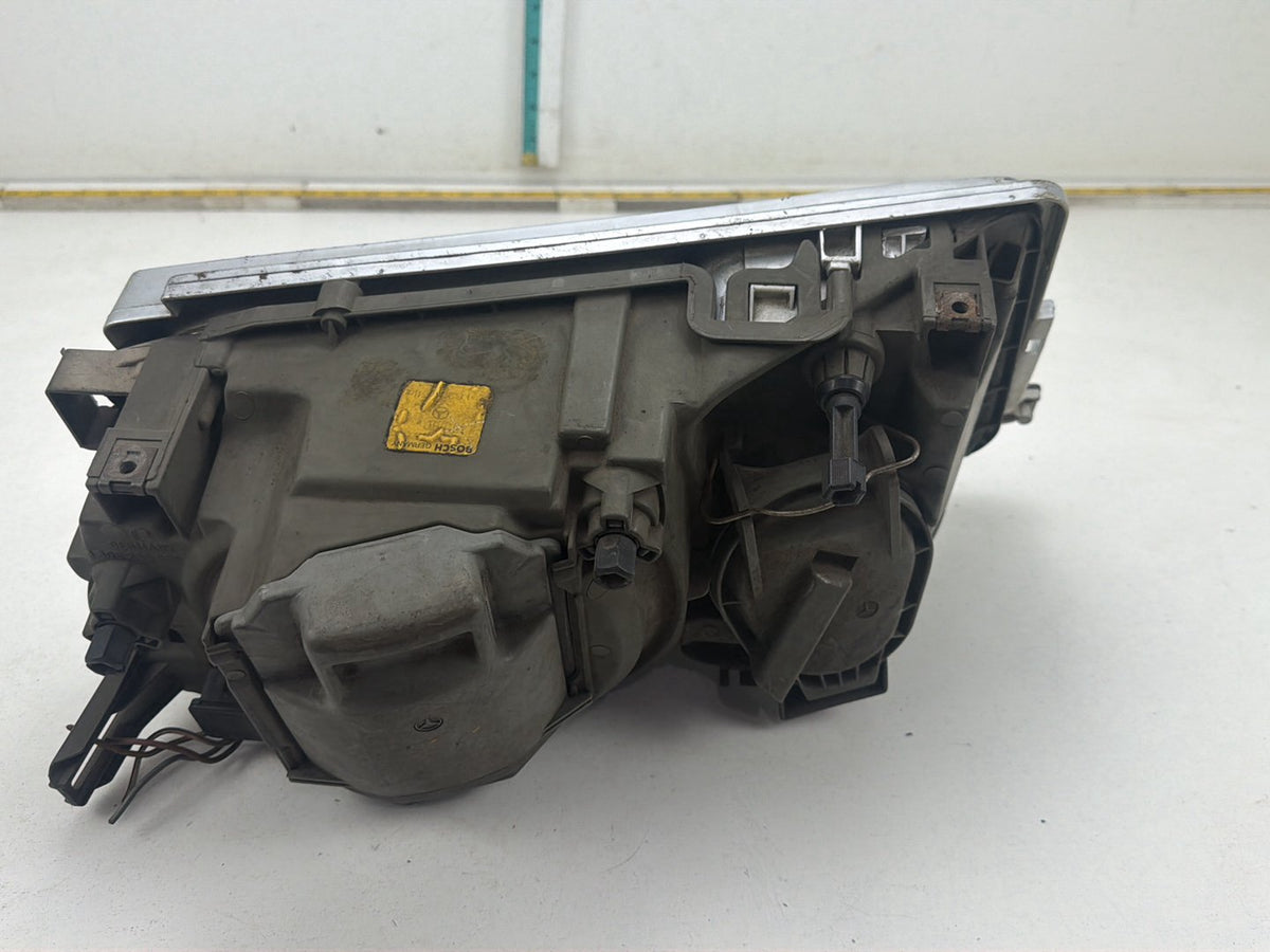 1984-1986 Mercedes-Benz 190D Front Left Driver Side Headlight 1305235085 OEM