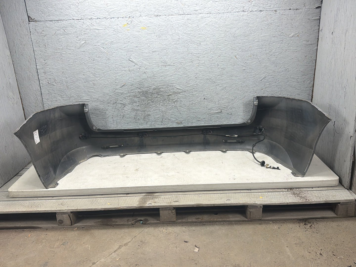 2011-2017 Toyota Sienna Rear Bumper Cover Panel w/ Park Assist OEM