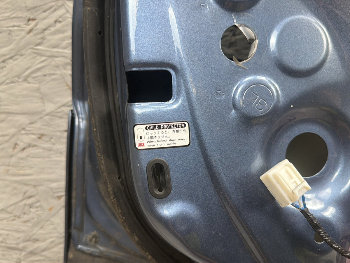 2003-2005 Toyota 4Runner Left Rear Driver Side Door Shell OEM