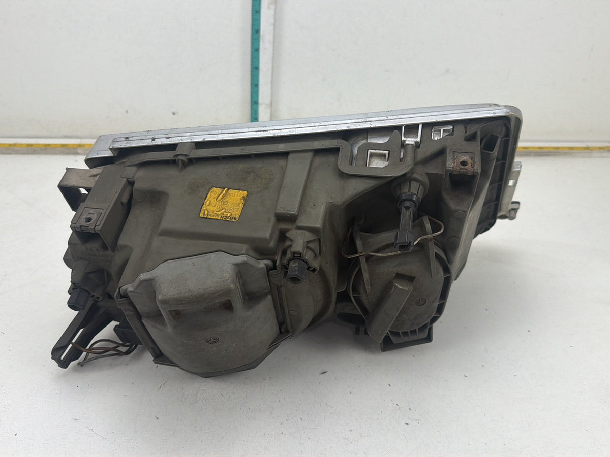 1984-1986 Mercedes-Benz 190D Front Left Driver Side Headlight 1305235085 OEM