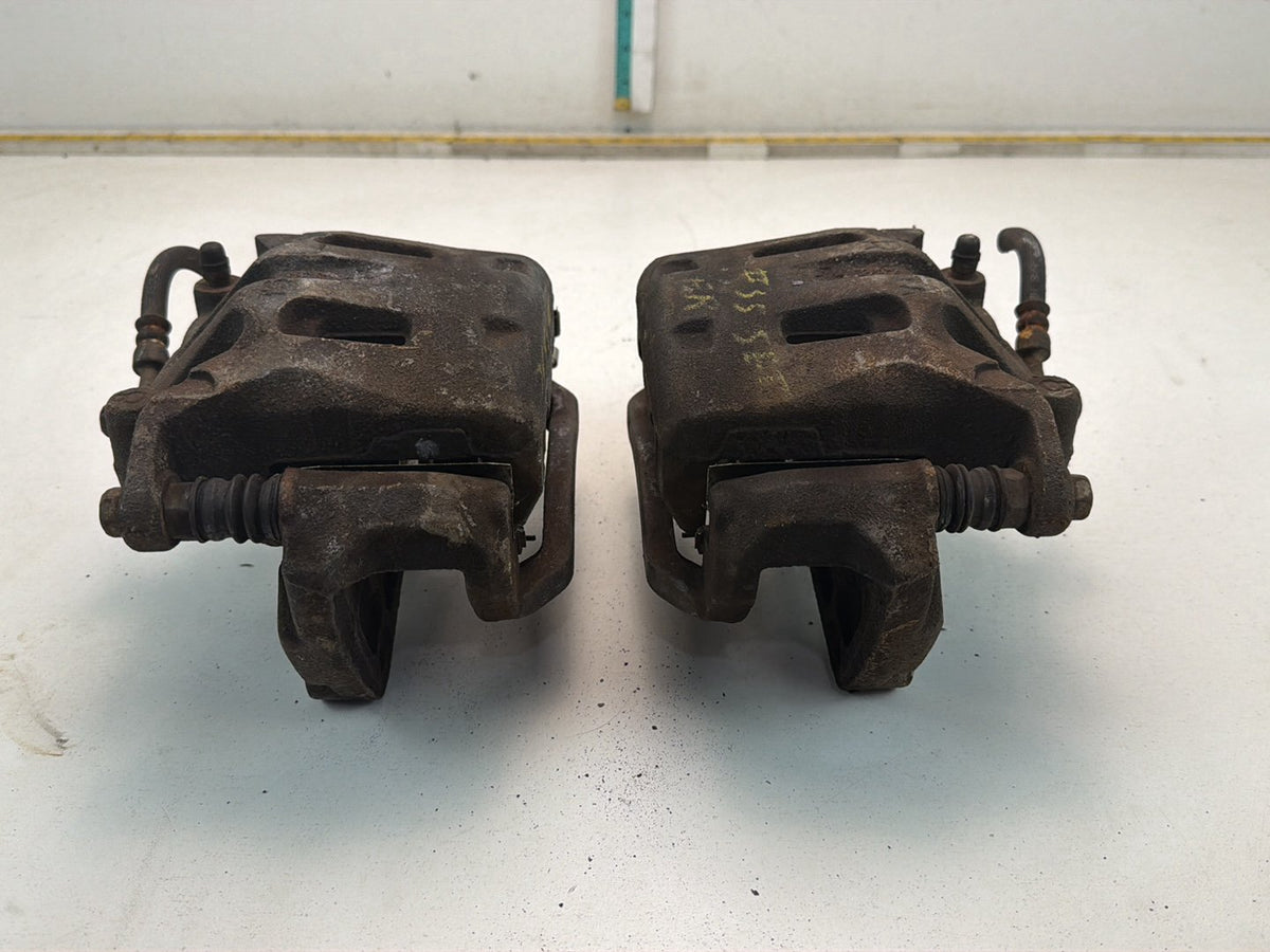 2009-2013 Infiniti G37 Front Dual Piston Brake Calipers w/ Brackets Pair OEM