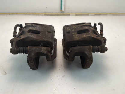 2009-2013 Infiniti G37 Front Dual Piston Brake Calipers w/ Brackets Pair OEM