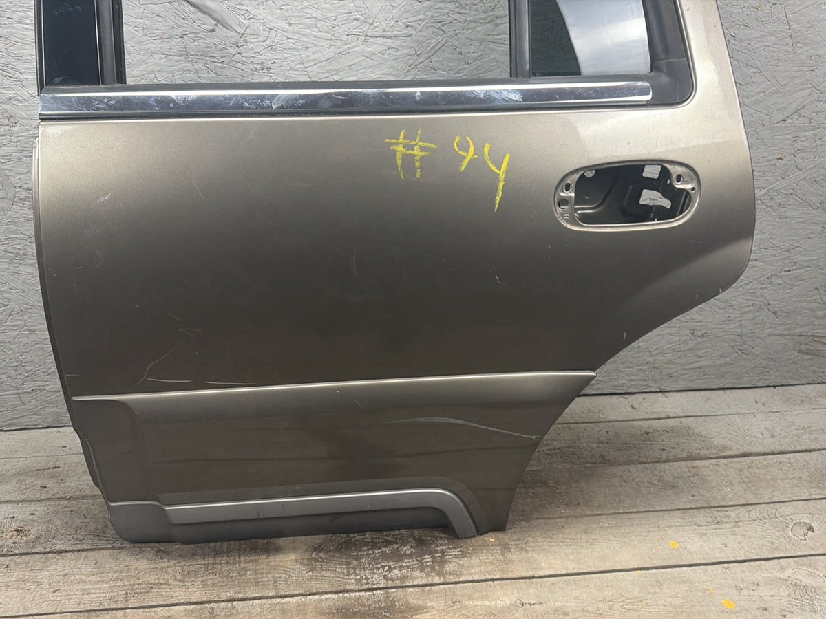 2003-2006 Lincoln Navigator U228 - Rear Left Door Shell OEM