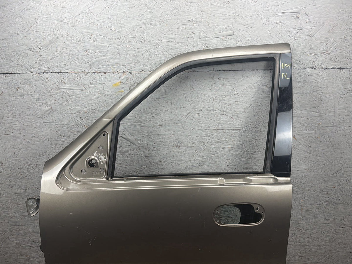 2003-2006 Lincoln Navigator U228 - Left Front Door Shell OEM