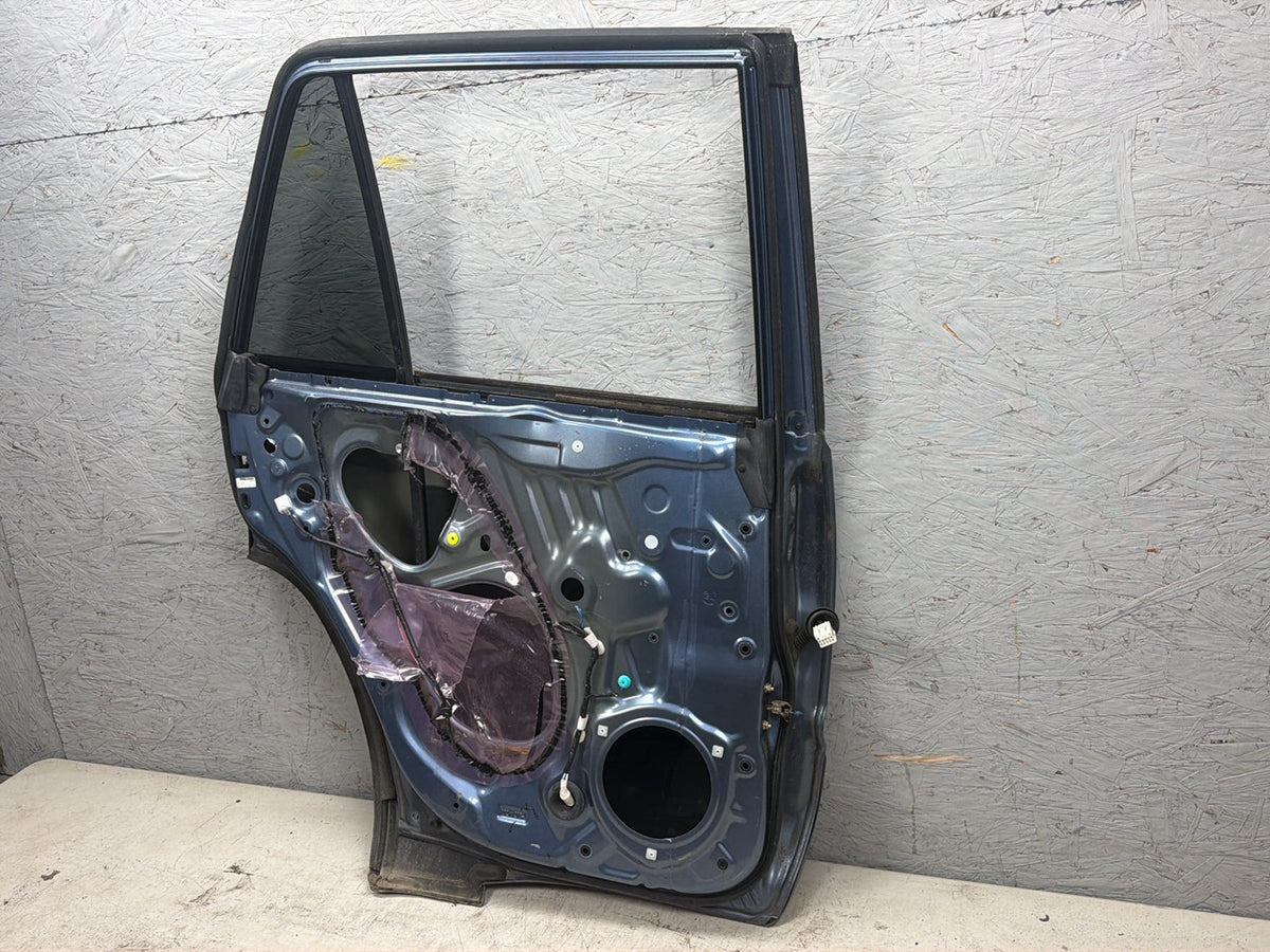 2003-2005 Toyota 4Runner Left Rear Driver Side Door Shell OEM
