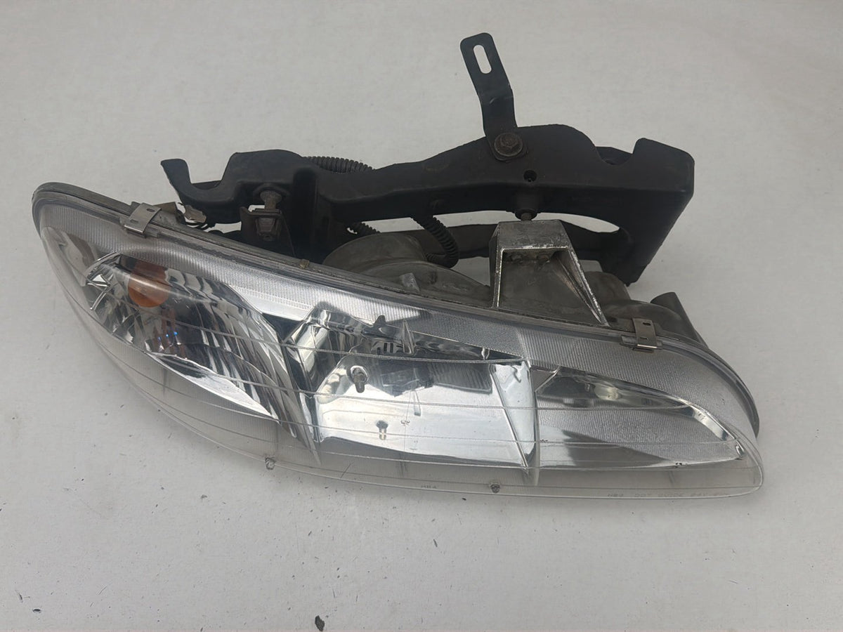 1996-1998 Pontiac Grand AM Front Right Passenger Side Headlamp Light OEM